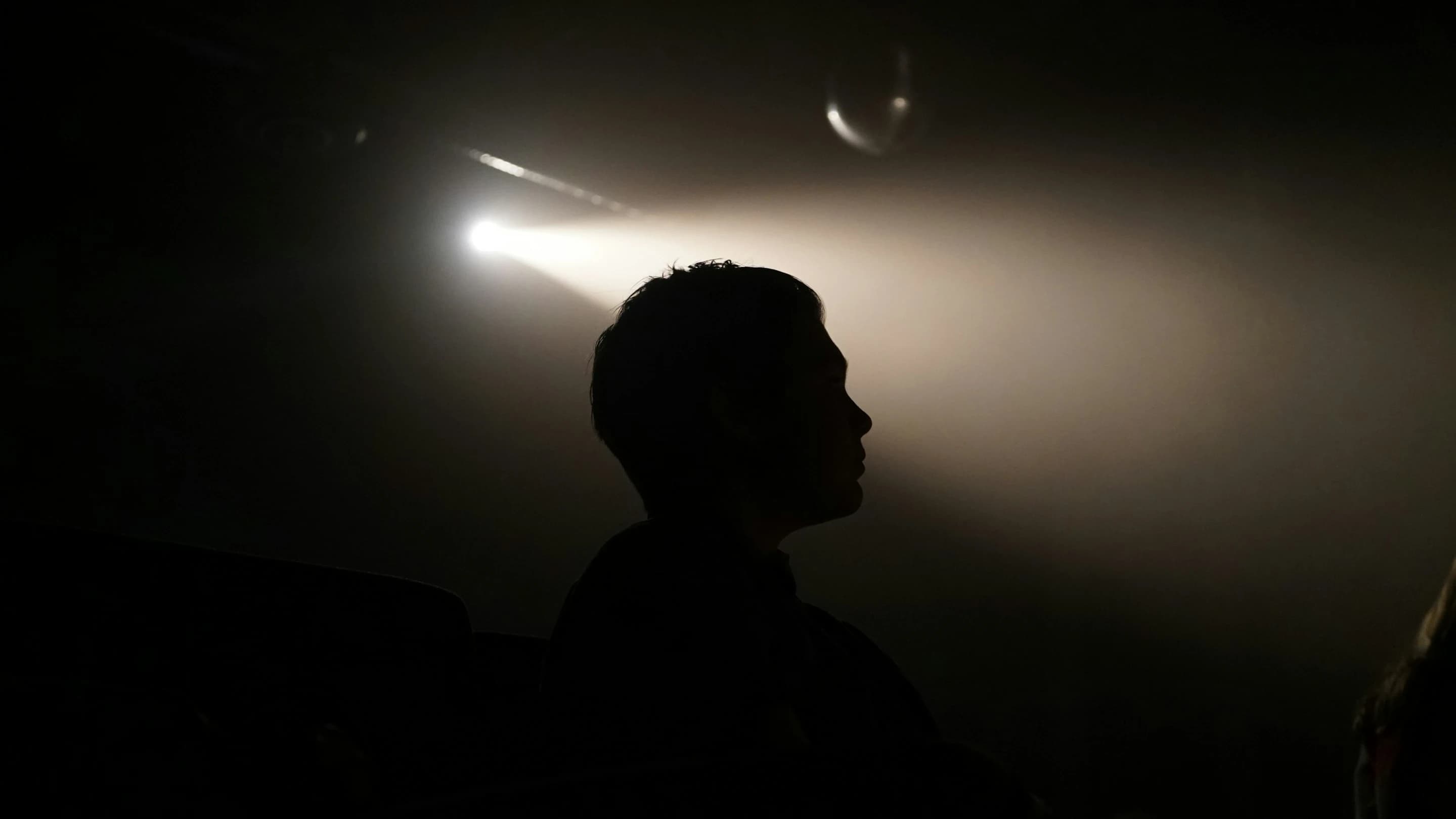 Spotlight over a dark stage